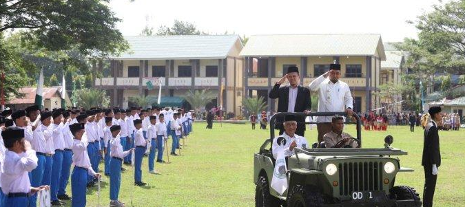 Pj Bupati Aceh Besar Pimpin Apel Tahunan 2024 Pesantren Tgk Chiek Oemar Diyan